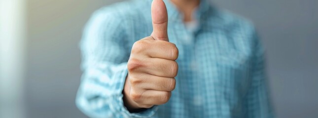 Satisfied customer holding a thumbs up sign, blank space for rating, natural lighting