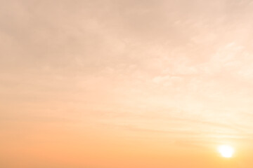 Fototapeta premium Beautiful morning or evening orange sky when sunset or sunrise used as natural background texture in decorative art work
