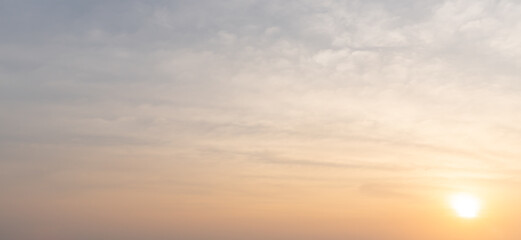 Beautiful morning or evening blue and orange sky taken at the sea while sunset or sunrise used as natural blackground texture in decorative art work