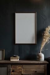 A decorative picture frame hangs on a wall above a dresser, perfect for displaying a treasured photo