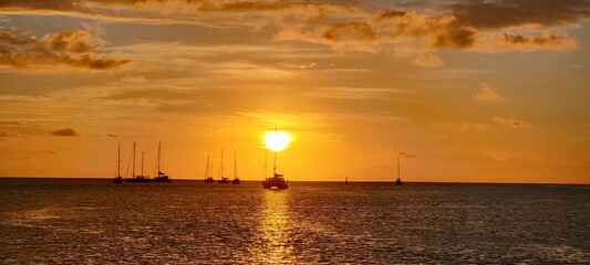 Sunset over the Caribbean Sea with sailboats silhouettes. San Andr&eacute;s (island) Colombia
