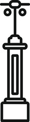 Simple black and white icon of a street lamp standing on a concrete base illuminating the night