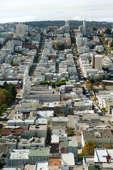 Densely placed residential and commercial buildings in San Francisco, CA.