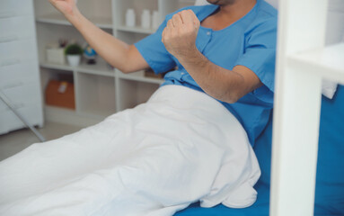 Obraz premium Portrait of happy caucasian sick patient on bed in hospital in medical and healthcare treatment at nursing home or clinic. People lifestyle