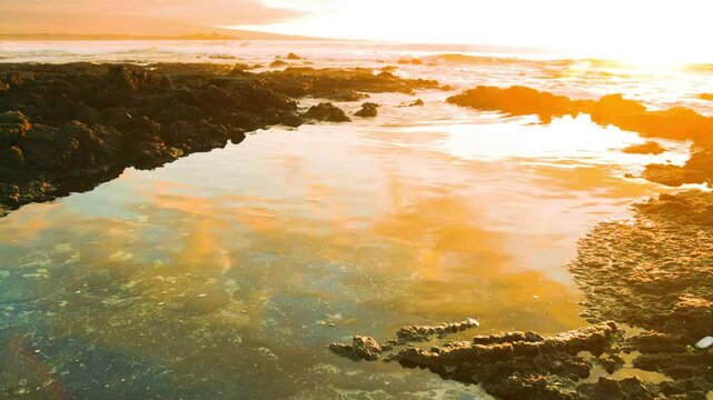 Sunset Reflections on Tide Pools on Giada's Beach, Hawaii Island, Hawaii, USA