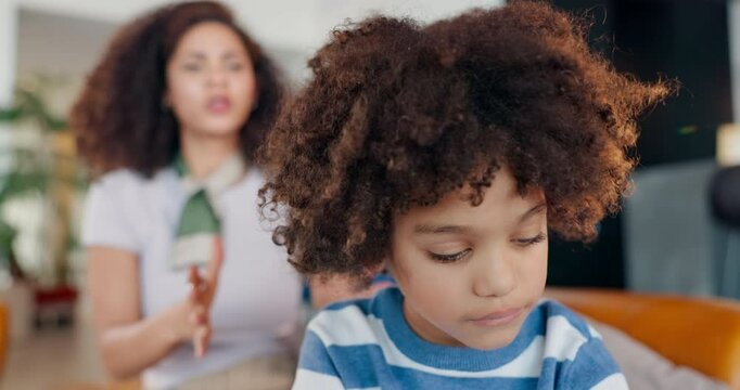 Mother, shouting and angry with boy in house, discipline issue and family crisis with child ignoring parent. Conflict, together and distressed woman in living room, childhood development and problem
