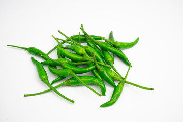 Green cayenne peppers in clusters. isolated on white background.