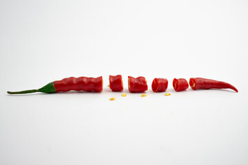 Large red chili slices. isolated in white background