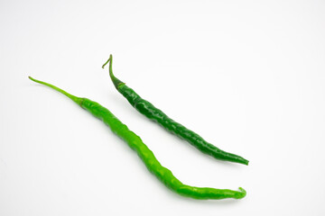 Curly green chilies in clusters. typical Indonesian. isolated on white background.
