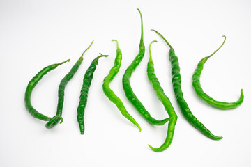 Curly green chilies in clusters. typical Indonesian. isolated on white background.