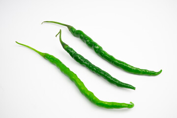 Curly green chilies in clusters. typical Indonesian. isolated on white background.