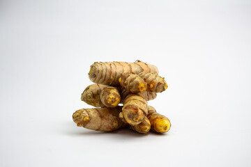 Turmeric is a typical Indonesian spice that is yellow in color. in Groups. typical Indonesian. isolated on white background.