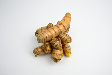 Turmeric is a typical Indonesian spice that is yellow in color. in Groups. typical Indonesian. isolated on white background.