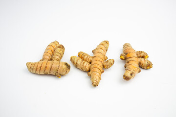 Turmeric is a typical Indonesian spice that is yellow in color. in Groups. typical Indonesian. isolated on white background.