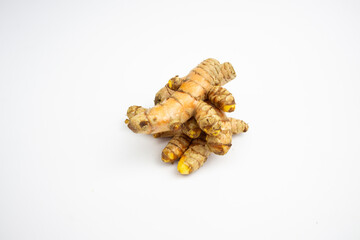 Turmeric is a typical Indonesian spice that is yellow in color. in Groups. typical Indonesian. isolated on white background.
