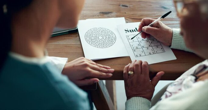 Assessment, number game and senior woman hands with nurse in retirement home with paper. Memory activity, brain and Alzheimers test for neurology, problem solving and cognitive function with nursing