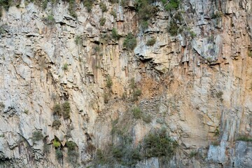 rough cliff, stone wall