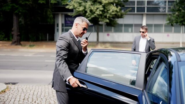 Professional Bodyguards Ensuring Safety for High-profile Businessman