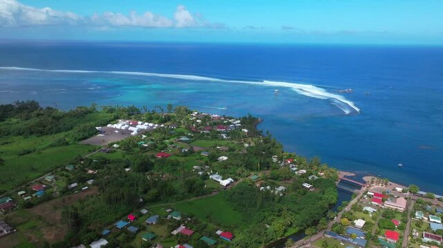 Teahupoo Tahiti pedestrian bridge judge tower aerial drone view French Polynesia coastline town village new Olympic 2024 sunny surf waves channel Point boats river Faremahora Pass Havae circle right