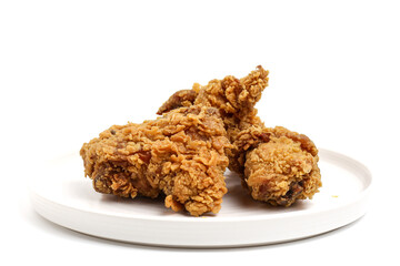 Crispy and crunchy fried chicken isolated on white background. perfect for photo illustration, design element, or any commercial purposes.
