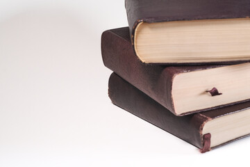stack of old books on white