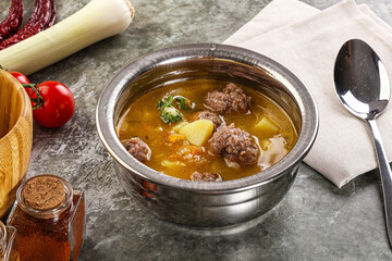 Soup with beef meatball and vegetables