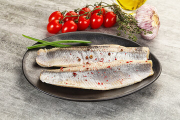 Marinated herring fillet with green onion