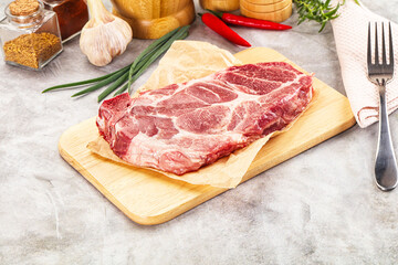 Raw pork neck steak for grill
