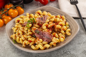 Italian pasta cellentani with anchovy