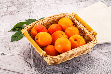 Raw ripe sweet apricots heap