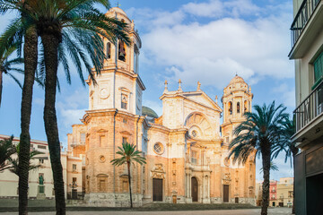 Cadiz Cathedral facade surrounded by palm trees in Andalusia, Sp © Cavan