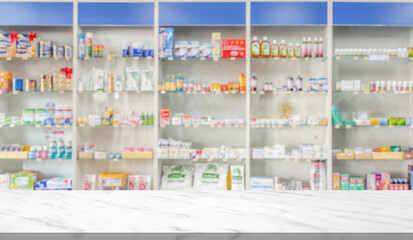 Empty white marble counter top with blur pharmacy drugstore shelves background