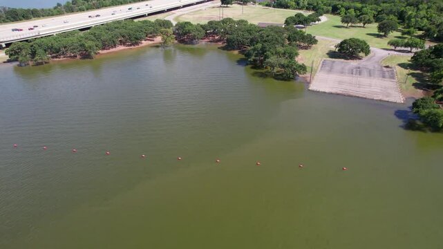 Aerial video of the flooded boat ramp at Copperas Branch Park on Lake Lewisville in Texas.  This was shot in June of 2024 after a series of storms raises the level of the lake substantially.