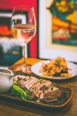 Grilled IBERICO PORK RIBEYE with white miso and gem lettuce