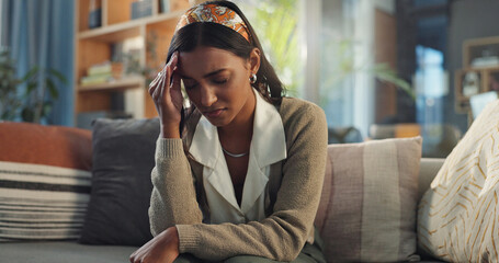 Sick, woman and headache on sofa in home for health problem, fatigue and low blood pressure of...