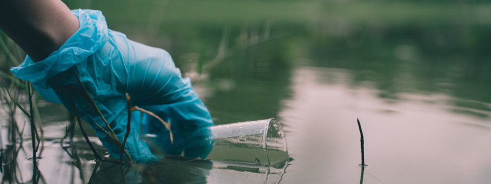 Sure! "I collected a water sample from the river by hand and stored it in a tube for chemical analysis to test for pollution, assessing its impact on the environment."