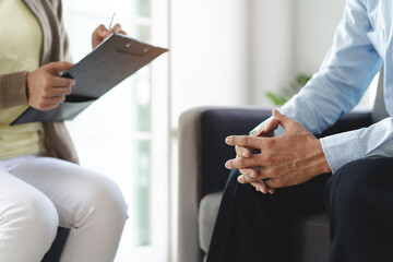 psychologist talking with depressed patient about mental condition.