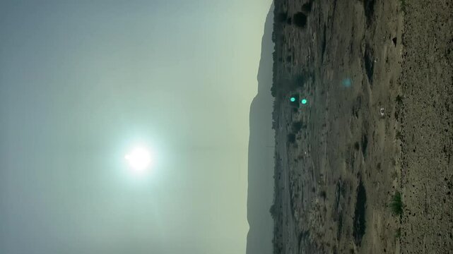 View of desert steppe from car window in Zagora Morocco