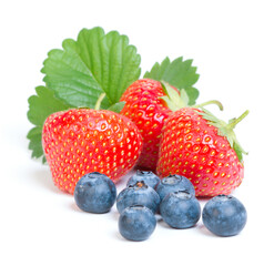 strawberries and blueberries on white background