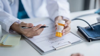 Fototapeta premium Medical Consultation Doctor Discussing Medication with Patient