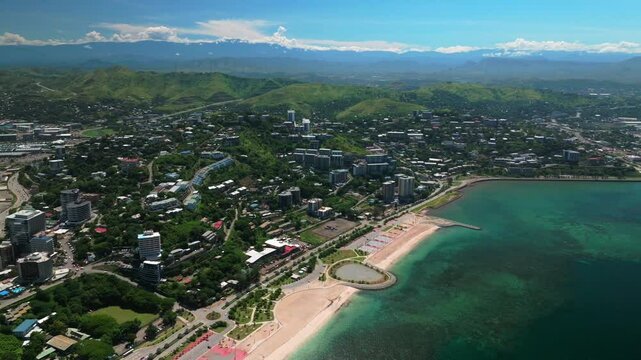 Ela Beach point Port Moresby APEC Haus Convention center Capital City Central Business District aerial drone Papua New Guinea PNG traffic cars Idlers Bay Hilton Marriot Crowne Plaza forward downward