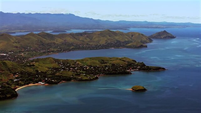 Walter Bay Port Moresby Papua New Guinea parallax aerial drone capital city Harbour Marina PNG beautiful sunny blue sky morning islands Ela Beach Crown Hotel Plaza Hilton Coral Sea circle left