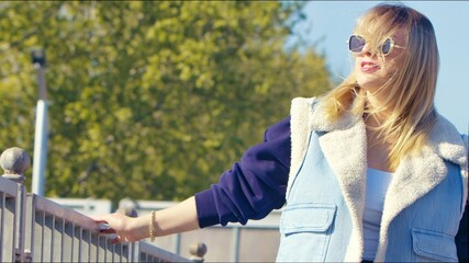 Young Blond Woman with Glasses in Nature Outdoor