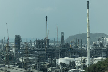 Fototapeta premium Oil refinery industry with valves Large on island.