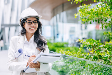 Architect Indian engineer female designer. environmental work design space for green city urban garden office building for eco saving energy.