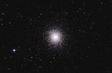 Messier 13 or M13 showing globular star cluster of stars in space © Daan