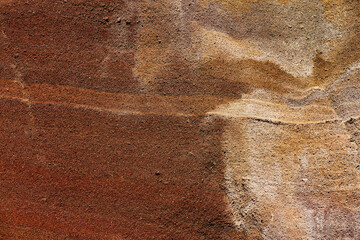 Red soil. Textured natural background. Mineral outdoor ground. Copy space