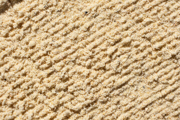 Abstract beige ground ginger background. Creativity in cooking.