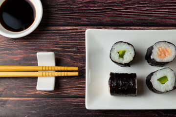 sushi with chopsticks