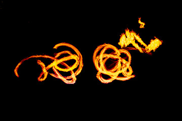 beautiful abstract shapes with fire flame, resulting in an captivating image, lightpainting, Fire Motion during a Show